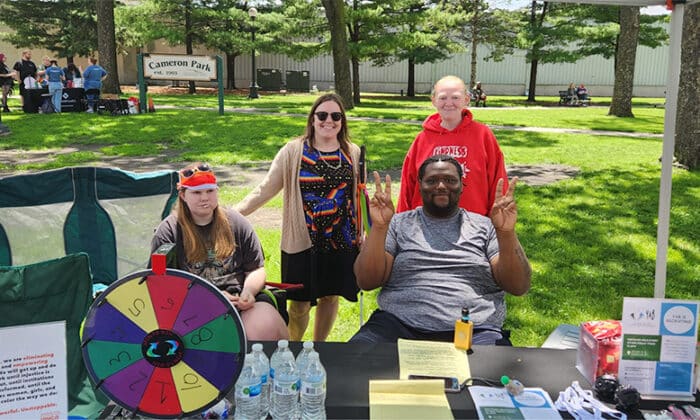 Coulee Region YAB members at Cameron Park working an educational booth